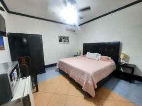 Garcias Suites y Hotel